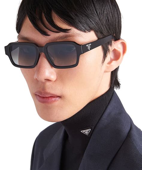 Prada PR 02ZS 1AB06T Sunglasses in Black.